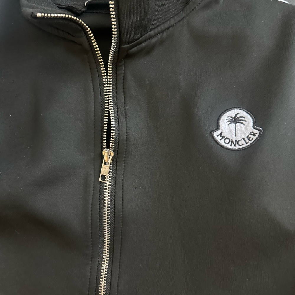 Moncler Black Suit with Sleek Design